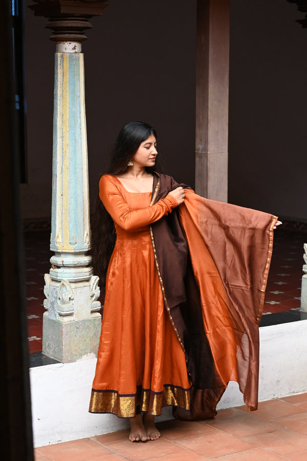 Rust pure chanderi anarkali with chettinadu border and pure chanderi dupatta